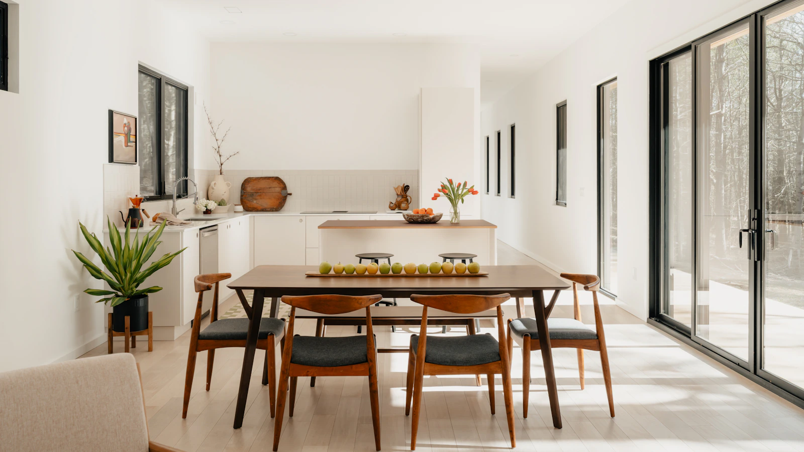 Residential dining room with wooden dining chairs and table