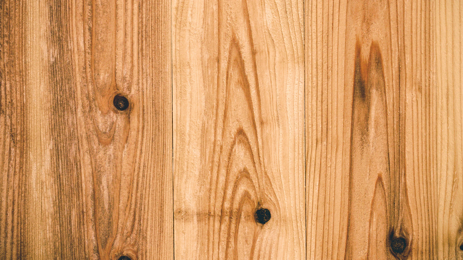 Light wood boards showing natural differences in grain and tone