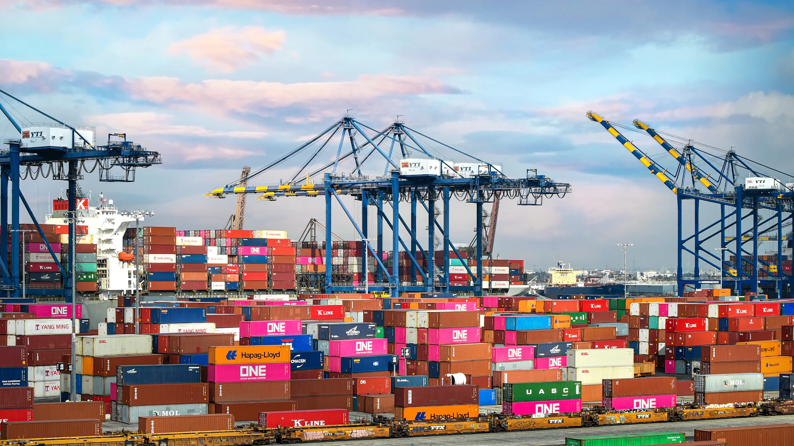 Stacked freight containers illustrating international shipping responsibility