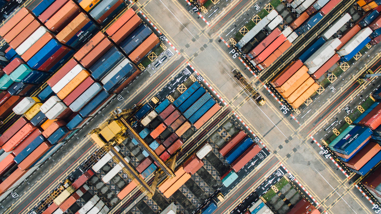 Container vessel at a port illustrating international freight movement