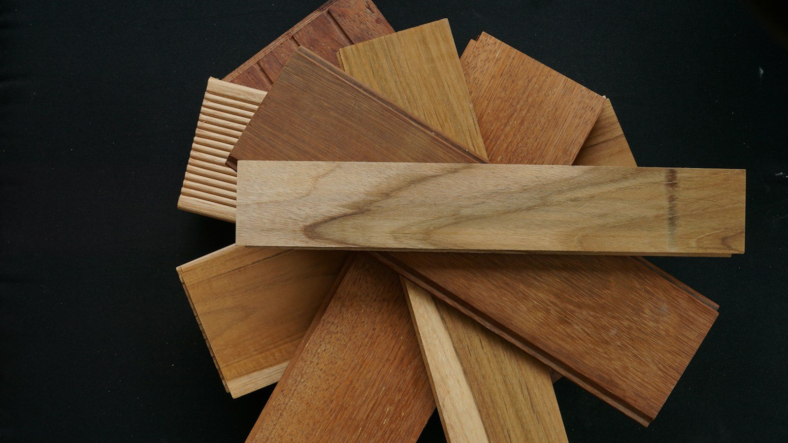 Wood samples showing different finish tones and surface appearances